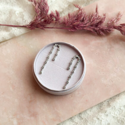 Lulu glam ørestikker - sølvfarve